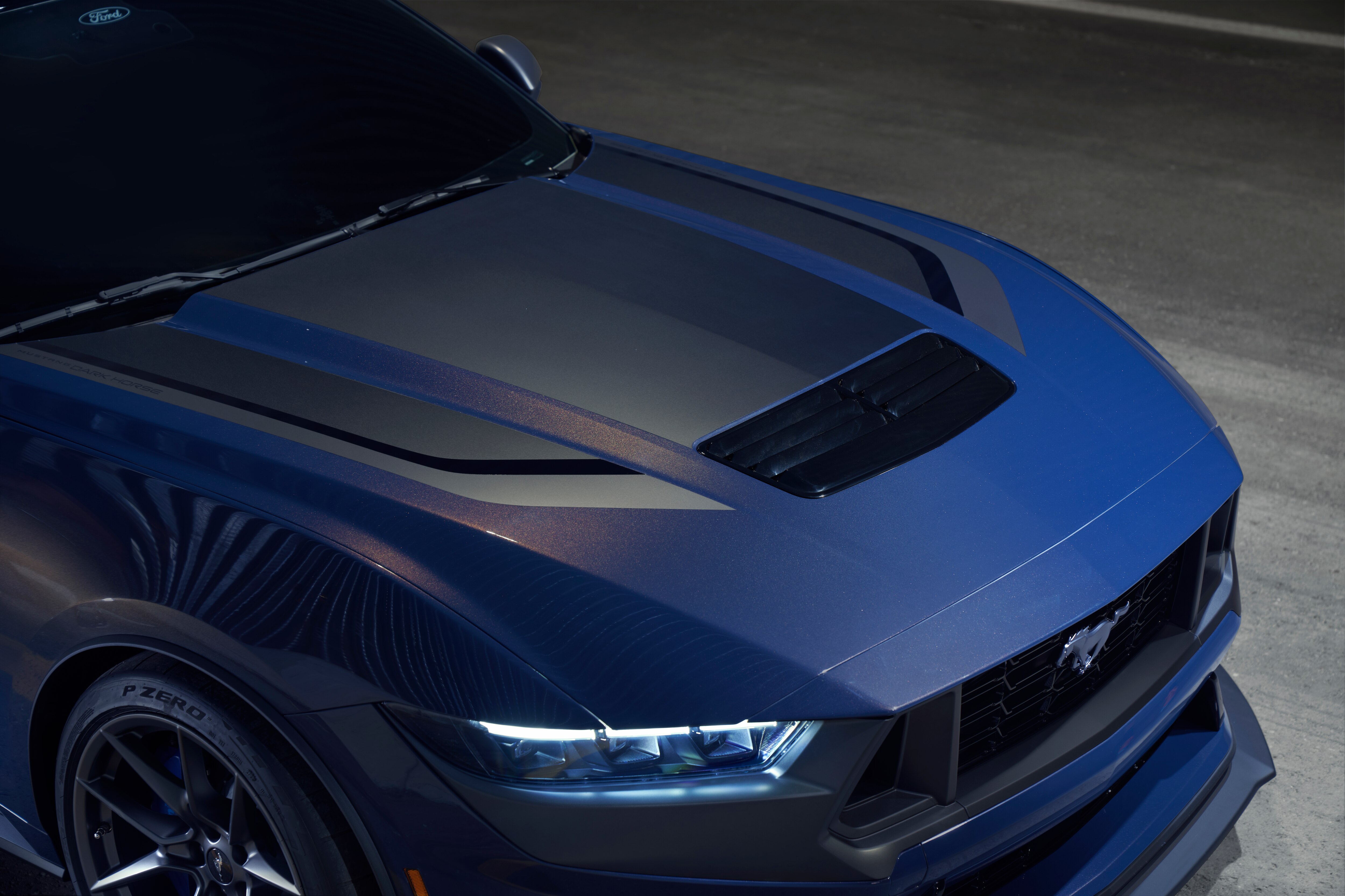 With sinister looks and a specially modified 5.0-liter V8 – the most powerful 5.0-liter V8 ever, projecting 500 horsepower – Dark Horse expands the Mustang lineup and sets a new benchmark for American street and track performance that could only come in a Mustang. Pre-production vehicles shown. 
